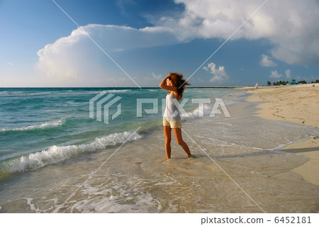 Young woman on the beach Young woman on the beach 6452181