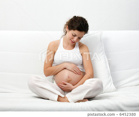 Young pregnant woman Young pregnant woman 6452380