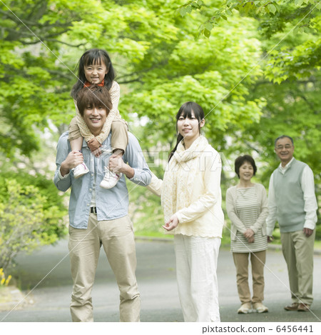 Three generation family walking in fresh green Three generation family walking in fresh green 6456441