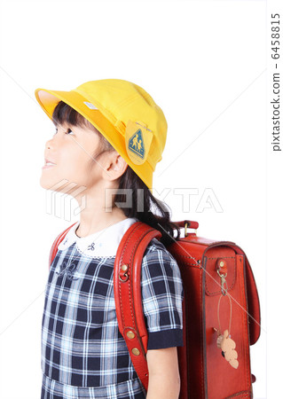 A girl in a school bag A girl in a school bag 6458815