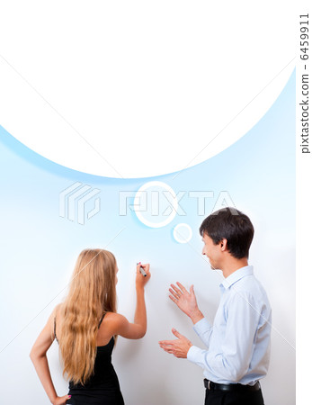 Confident adult teacher helping to students in school classroom Confident adult teacher helping to students in school classroom 6459911