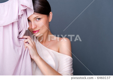 Portrait of pretty fashionable woman trying new clothes. Fashion Portrait of pretty fashionable woman trying new clothes. Fashion 6460137