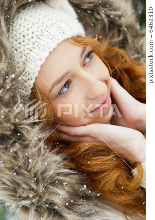 Portrait of pretty girl at winter background wearing warm clothe Portrait of pretty girl at winter background wearing warm clothe 6462310