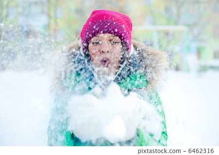 Christmas Girl.Winter woman Blowing Snow. Front View Christmas Girl.Winter woman Blowing Snow. Front View 6462316
