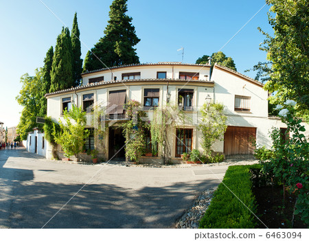 Spanish house with greenery around it. Hotel at Alhambra Spanish house with greenery around it. Hotel at Alhambra 6463094