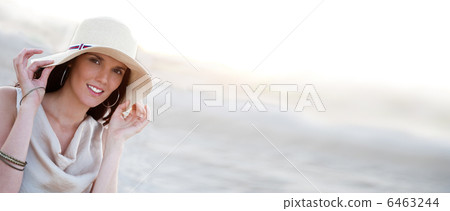 Summer portrait of beautiful woman wearing hat. Vacation at warm Summer portrait of beautiful woman wearing hat. Vacation at warm 6463244