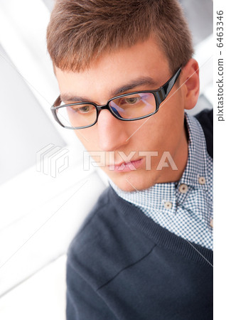 A university college student or casual good looking man wearing 6463346