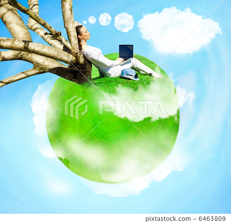 Young woman sitting under tree at her own small planet flying at 6463809