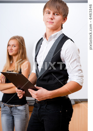 Portrait of college students making presentation of their projec 6463846
