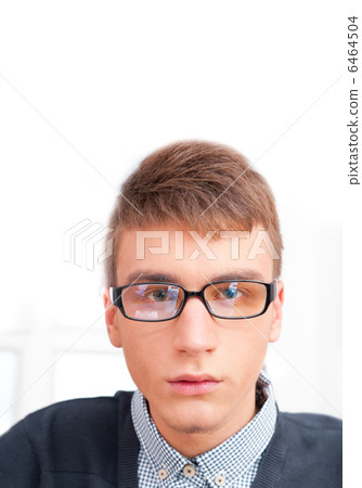 A university college student or casual good looking man wearing 6464504