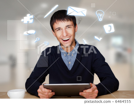 A businessman with icons floating around his head. Portrait of h A businessman with icons floating around his head. Portrait of h 6464555