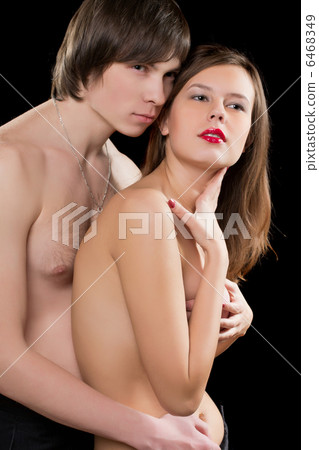 Portrait of a young naked couple 6468349