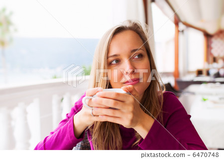 Woman tasting coffee 6470748