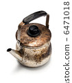Worn-out kettle _ overhead view _ white back 6471018
