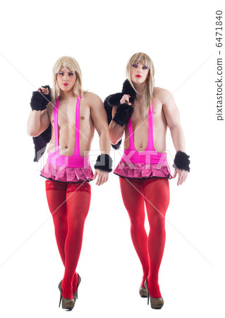 Two transvestites in pink costumes isolated 6471840