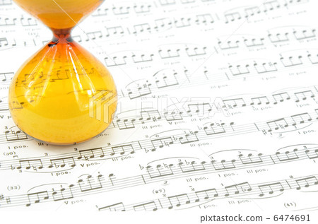 Music score and hourglass Music score and hourglass 6474691