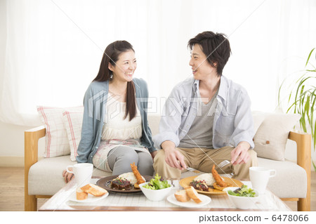 Sofa relaxing young couple 6478066