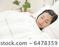 A young lady sleeping on bed 6478359