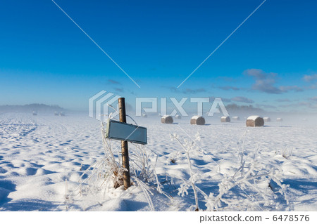 Farm name road sign near winter field 6478576