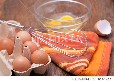 Wire whisk and eggs Wire whisk and eggs 6484736