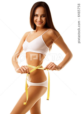 Woman measuring perfect shape of beautiful thigh 6485758