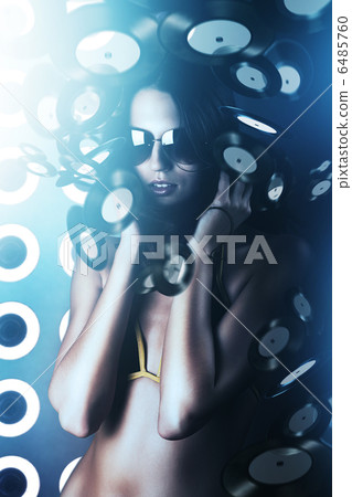 attractive woman in sunglasses with long hair in light attractive woman in sunglasses with long hair in light 6485760