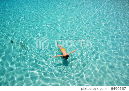 Woman snorkeling 6490167