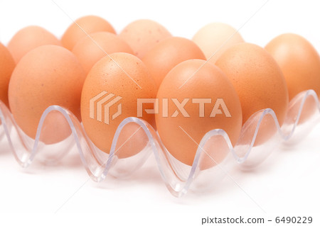 fresh yellow chicken eggs in container 6490229