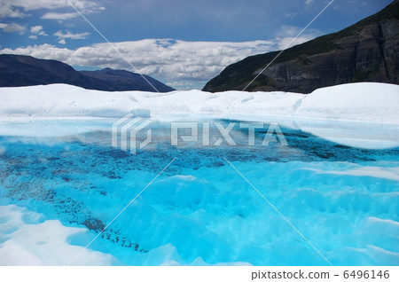 Blue lake of the Pelitomorno glacier 6496146