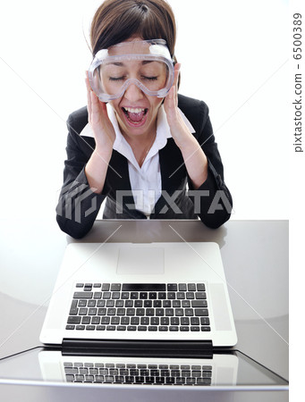 business woman working on laptop business woman working on laptop 6500389