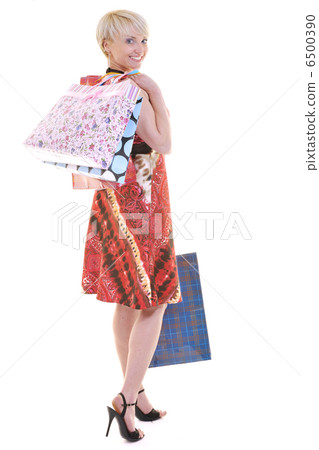 happy young adult women shopping with colored bags 6500390