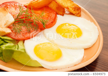 fried eggs with vegetables fried eggs with vegetables 6504973