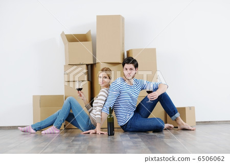 Young couple moving in new house Young couple moving in new house 6506062