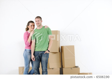 Young couple moving in new house Young couple moving in new house 6506190