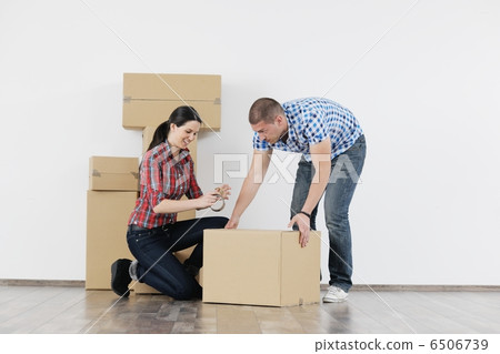 Young couple moving in new house 6506739
