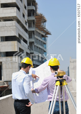 Team of architects on construciton site Team of architects on construciton site 6507517