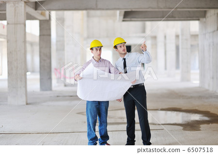 Team of architects on construciton site Team of architects on construciton site 6507518