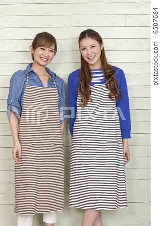Two women in an apron 6507684