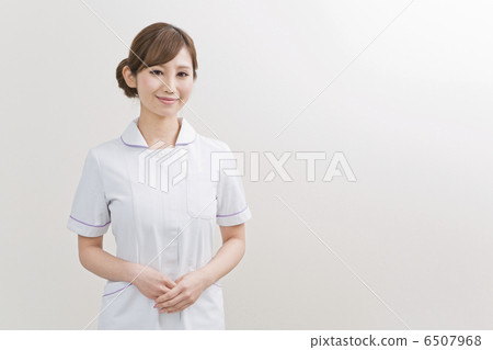 A woman in a white coat A woman in a white coat 6507968