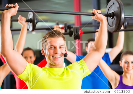 weight training in the gym with dumbbells weight training in the gym with dumbbells 6513503