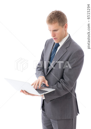 Foreign businessman who uses computer 6515294