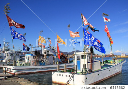 A Fishing Boat Holding A Big Catch Flag Stock Photo