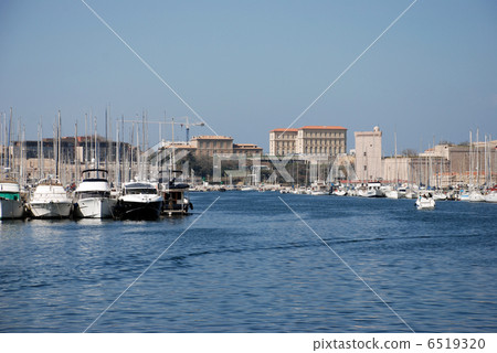The lively marina scenery and rows of buildings in Marseille's Old Port The lively marina scenery and rows of buildings in Marseille's Old Port 6519320