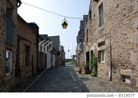 The streets of Saint-Suilliac, lined with traditional stone houses of Brittany. The streets of Saint-Suilliac, lined with traditional stone houses of Brittany. 6519577