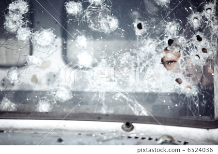 Man behind broken glass Man behind broken glass 6524036