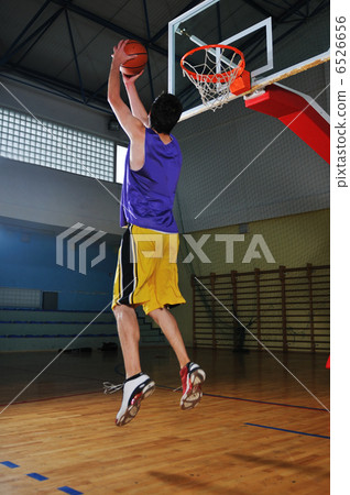 basket ball game player at sport hall basket ball game player at sport hall 6526656