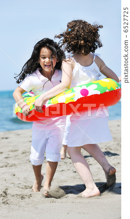 happy child group playing on beach happy child group playing on beach 6527725