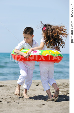 happy child group playing on beach happy child group playing on beach 6527726