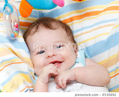 Portrait of smiling baby girl 6530892