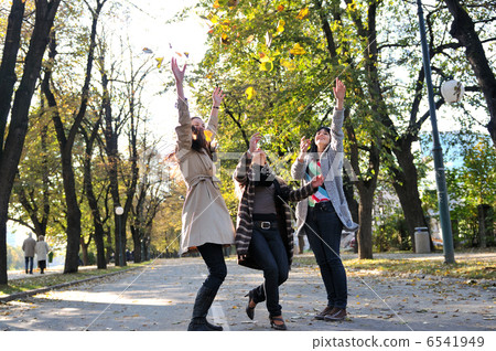 Three young ladies enjoying themselves Three young ladies enjoying themselves 6541949